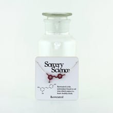 Resveratrol Molecule Two-Point Necklace in Transparent Red Acrylic on Card for Retail